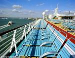 ID 2932 EXPLORER OF THE SEAS (2000/137308grt/IMO 9161728) - Sunloungers alongside the jogging track on Deck 12.